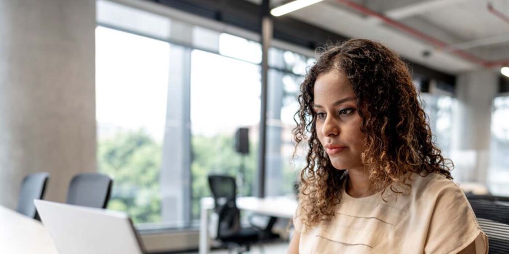 HR professional writing a job description